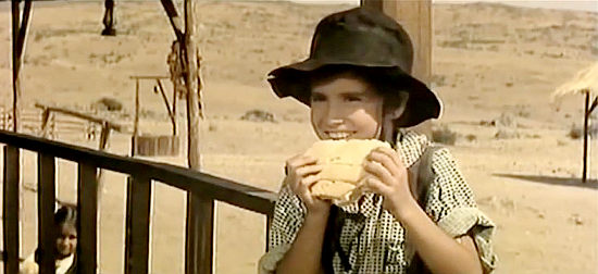 Miguel Angel Hidalgo as Sarah's son in Dollars for a Fast Gun (1966)