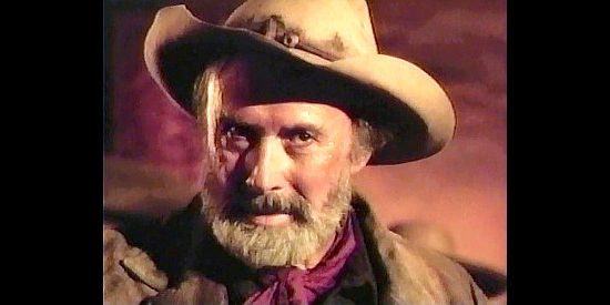 Richard Kiley as Chalk Brighton, about to engage in poisonous Russian roulette in Gunsmoke, The Last Apache (1990)