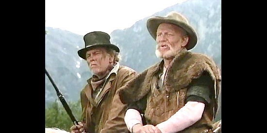 Tony Epper as Farnum McCloud and William Morgan Sheppard as Digger McCloud, brothers after the reward on Flagg's head in Gunsmoke, Return to Dodge (1987)