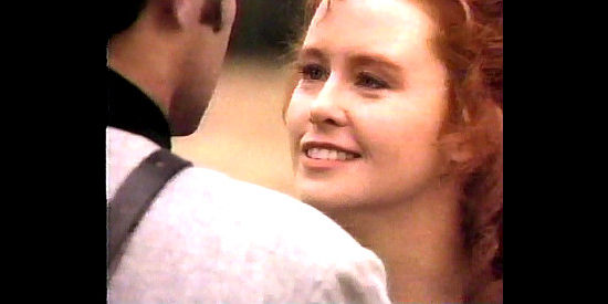 Tracy Griffith as Rebecca Morgan Doyle, on an unexpected visit to her husband in For Love and Glory (1993)