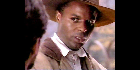 Victor Love as Peyton, the Elysian Fields slave the North would like to turn into a sp in For Love and Glory (1993)y