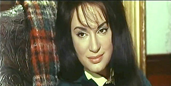 Adriana Ambesi (Audrey Amber) as Julia Brooks, running a mine with 157 men on her payroll in Joe Dexter (1965)