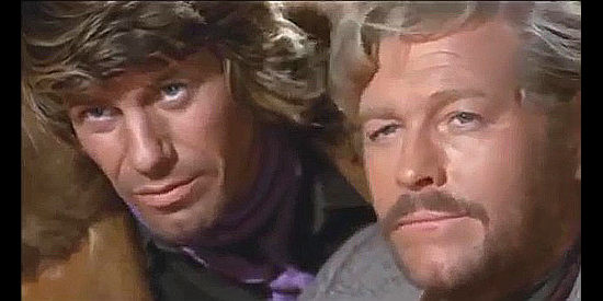 Brothers Copper Craig (Aldo Berti) and Jason Craig (Wayde Preston) wonder what to do about their new partner in Ballad of Death Valley (1970)