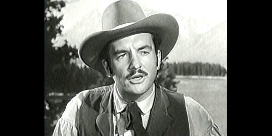 Donald Curtis as John Fulton, the lawman on Bad Bascomb's trail in Bad Bascomb (1946)