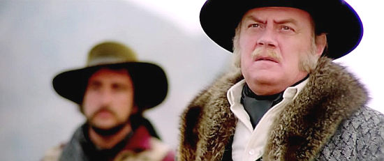 Ettore Manni as Thomas Barrett, an aging land baron trying to hold onto his fortune in Silver Saddle (1978)