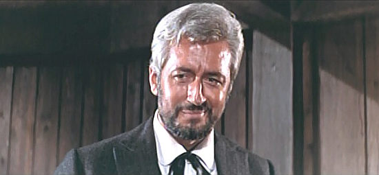 Franco Fantasia (Frank Farrell) as the sheriff of Wishville, trying to convince Johnny to become his deputy in Seven Dollars on the Red (1966)