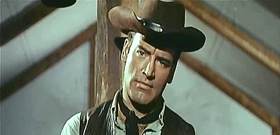 George Martin as Joe Dexter, aka Nevada Joe, questioning one of Julia's employees in Joe Dexter (1965)