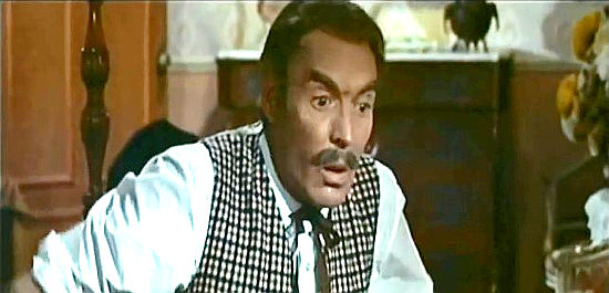 Giuseppe Addobbati (John McDouglas) marveling over Joe Dexter's luck with the ladies in Joe Dexter (1965)