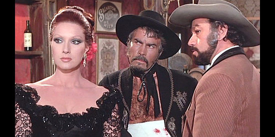 Helga Line as Maybelle with a suspicious Angel (Jose Canalejas) and Grayson (Aldo Sambrell) in Raise Your Hands Dead Man, You're Under Arrest (1971)