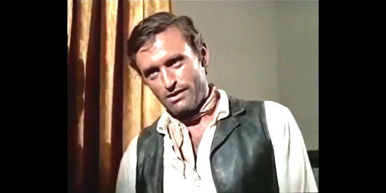 Jean Louis as Ringo Wood, wondering what Pilar knows about the deaths at the Alonzo hacienda in Ringo, It's Massacre Time (1970)