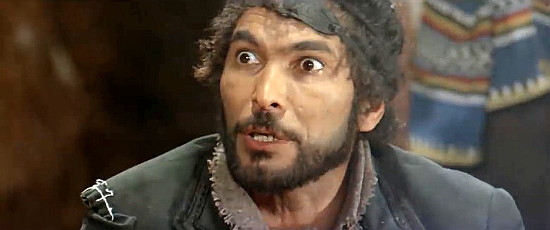 Jose Torres as Santo, the revolutionary and bandit who breaks Django out of jail in Death is Sweet from the Soldier of God (1972)