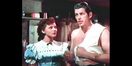 Lorna Gray as Molly Bannister with wounded boyfriend Bud Courteen (James Brown) in Brimstone (1949)