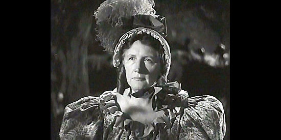 Marjorie Main as Flapjack Kate, warning Big Jack note to betray a new friend in Big Jack (1949)
