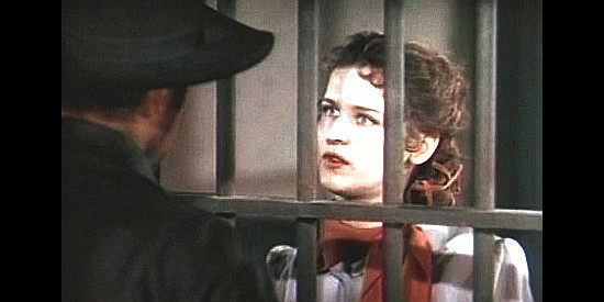 Mary Howard as Edith Keating, pleading with Billy to remember her father's wish for justice by peaceful means in Billy the Kid (1941)