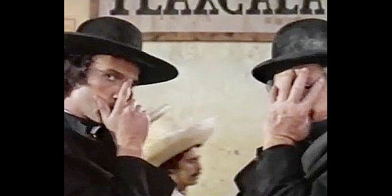 Riccardo Salvino as John and Lionel Stander as Sam spy on a train filled with gold while trying to hide their ungodly intent in Hallelujah to Vera Cruz (1973)