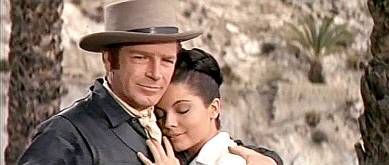 Richard Basehart as Steve Fallon with Maria Granada as Juana in Savage Guns (1962)