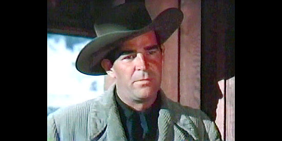 Rob Cameron as Johnny Tremaine, the lawman trying to clean up a mess in Brimstone (1949)