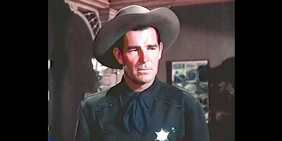Rob Cameron as Johnny Tremaine, tracking down the Courteen gang in Brimstone (1949)