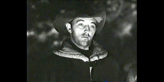 Robert Mitchum as Jim Garry, getting the first hint he's ridden into trouble in Blood on the Moon (1948)
