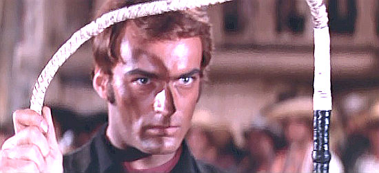 Roberto Miali (Jerry Wilson) as Jerry Ashley, about to show how mean he can be in Seven Dollars on the Red (1966)