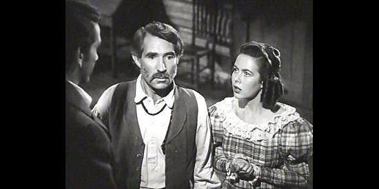 Trevor Bardette as John Oakes and Vanessa Brown as Patricia, considering whether to let the doctor operate on Oakes' wife in Big Jack (1949)