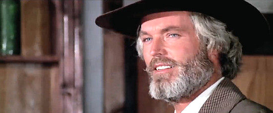 Ty Hardin as Jack Sacramento Thompson, enjoying a drink at his favorite saloon in You're Jinxed Friend, You've Met Sacramento (1972)