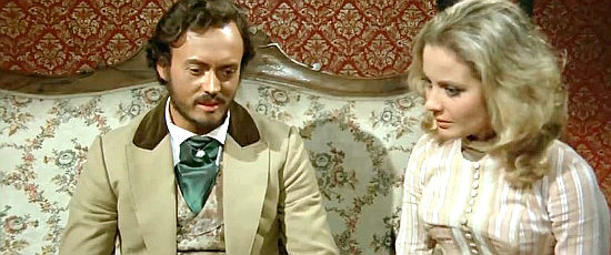 Vassili Karis as Scott Miller discusses his Django problem with girlfriend Giselle (Zara Cilli) in Death is Sweet from the Soldier of God (1972)