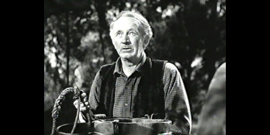 Walter Brennan as Kris Borden, a settler learning his son has died in Blood on the Moon (1948)
