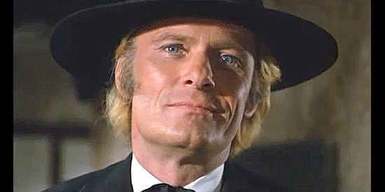 William Berger as Lee Calloway, showing up with a deal for the Craig brothers in Ballad of Death Valley (1970)