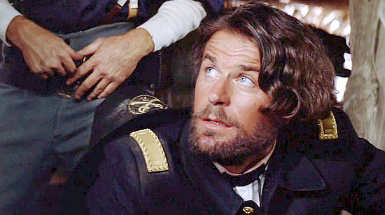 Charles Rocket as Lt. Elgin, questioning Dunbar about turning Indian in Dances with Wolves (1990)