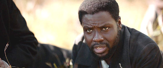 Dayo Okeniyi as Shields Green as John Brown's men prepare to assault Harper's Ferry in Emperor (2020)