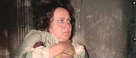 Giovanna Mainardi as the governor's wife, cowering under the threat of Frank O'Shaughnessy in Six Bounty Killers for a Massacre (1973)