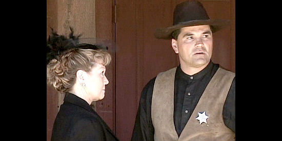 Mari-Jo Davis as the parson's wife, mendling in the personal life of Sheriff Tom Peavy (Angelo Ortega) in Sheriff of Contention (2010)
