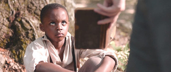 Trayce Malachi as Tommy Green, caught with a book in Emperor (2020)
