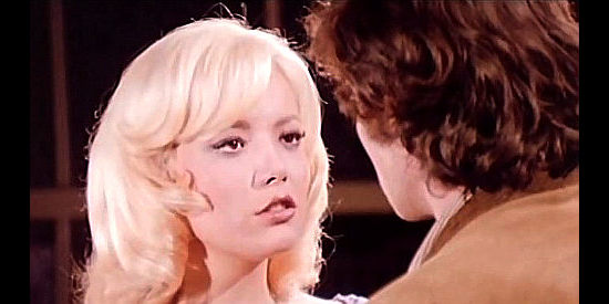 Agata Lys on Antonietta (Tony) Pickford, questioning whether she's fit for marriage after being raped in In the Name of the Father, the Son and the Colt (1971)