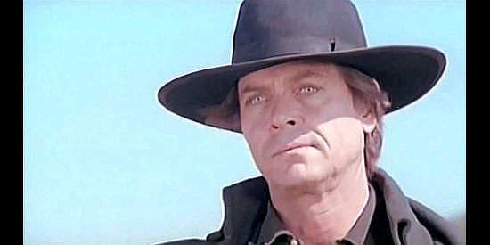 Craig Hill as Mace Cassidy spotting something he'll enjoy as much as money in In the Name of the Father, the Son and the Colt (1971)
