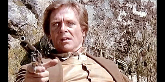 Craig Hill as Sheriff Bill Nolan, in a fight for his life in In the Name of the Father, the Son and the Colt (1971)