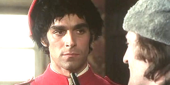Fabio Testi as Cpl. Bill Cormack, in a bit of a jam with a gun at his throat in Cormack of the Mounties (1975)