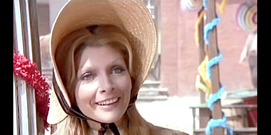 Nuccia Cardinali as Clarissa Nolan, the sheriff's wife, meeting Pic Pickford in In the Name of the Father, the Son and the Colt (1971)