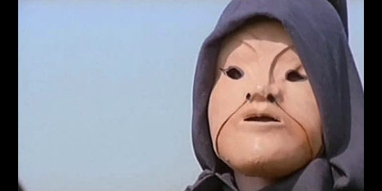 The man with a leather mask who shows up at robbery scenes in In the Name of the Father, the Son and the Colt (1971)