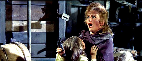 Adreina Paul as Mrs. Collins in "Road to Fort Alamo" (1964)