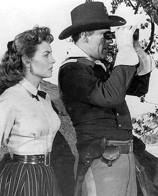 Donna Reed As Laurie Mackaye And Philip Carey As Capt. Peter Blake In 