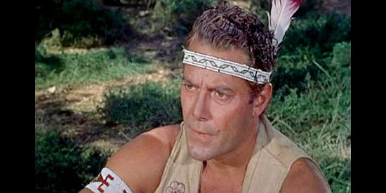Jon Hall as Prince Hannoc, caught between the world of the whites and his Delaware tribe in When the Redskins Rode (1951)