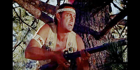 Jon Hall as Prince Hannoc, watching out for trouble for Washington's militia in When the Redskins Rode (1951)