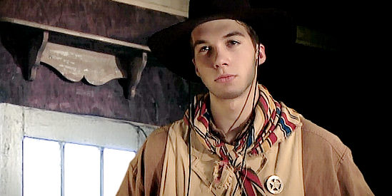 Adam Hegenbuch as Texas Ranger Flint, introducing himself to Mortimer in Hell's Fury (2009)