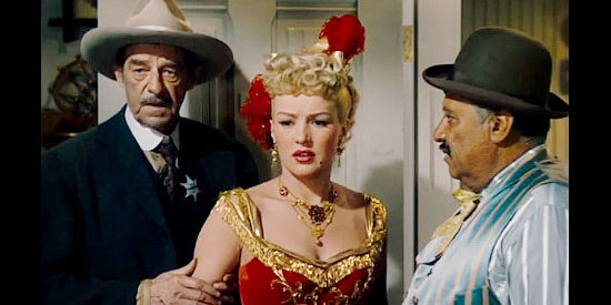 Al Bridge as Sheriff Ambrose, Betty Grabel as Freddie Jones and Chris-Pin Marin at bartender Joe, about to face the judge in The Beautiful Blonde from Bashful Bend (1949)