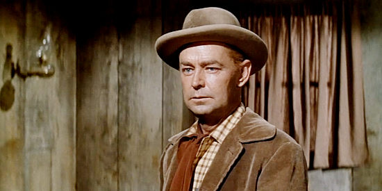 Alan Ladd as Mitch, a man with special plans for those he thinks contributed to his wife's death in One Foot in Hell (1960)