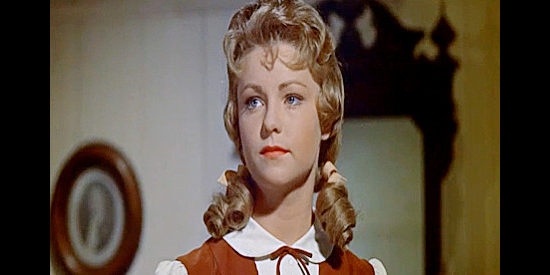 Alana Ladd as Jane Peterson, fretting over the well-being of boyfriend Bert Harvey after he's injured in a logging accident in Guns of the Timberland (1960)