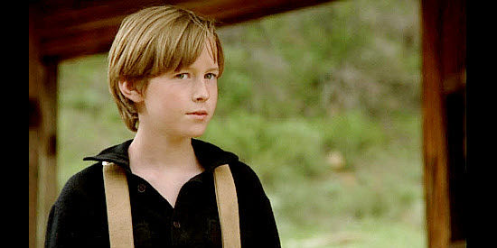 Alec Medlock as Daniel Fowler, the young boy kidnapped for bait by a pretend deputy in The Long Ride Home (2003)