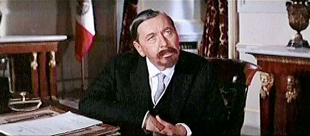 Alexander Knox as President Madero, hearing Villa's concerns about Huerta in Villa Rides (1968)